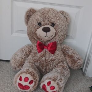 Adorable Brown Teddy Bear with Red Bow